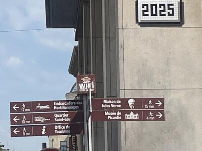 AMI_14, Space Invader on 2 Place Gambetta — Street art by Invader in Amiens
