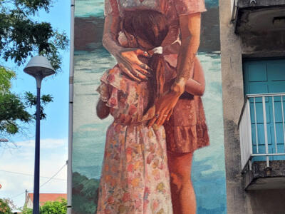Mother and Daughter by the Water — Street art by Megan Oldhues in Valence