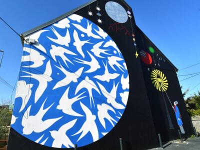 The Lamplighter — Street art by Honet in Caen
