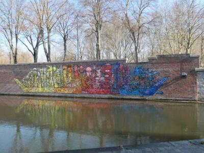 Horn-Prowed Boat of the Hortillonnages — Street art by Bault in Amiens