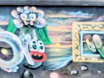 Fleur et œil dans cadre — Street art à Saint-Paul