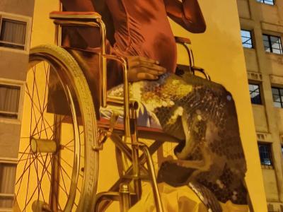 Young Woman in Wheelchair by CASE Maclaim — Street art by CASE Maclaim in Madrid