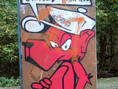 Personnage cartoon et citation philosophique — Street art à Berlin