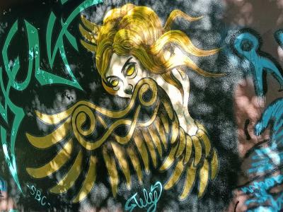 Golden Winged Goddess — Street art in Prague