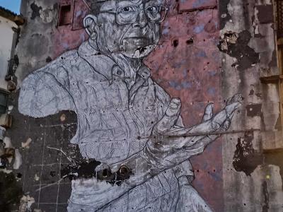 Portrait en grille géométrique — Street art de RUÍDO à Porto