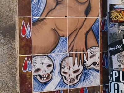 Figure and Skulls by Berri Blue — Street art by Berri blue in Porto