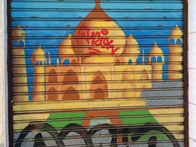 Orange and Blue House — Street art in Madrid