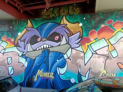 Blue Monster Surrounded by Letters by Moner — Street art by Moner in Nantes