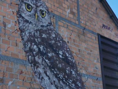 Gray Owl on Brick Wall — Street art by War in Marcillé-Robert