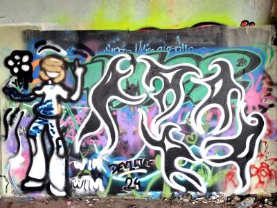 Character and Wavy Letters — Street art in Grenoble