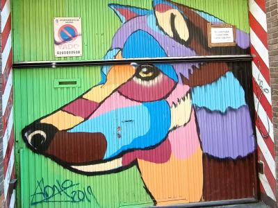 Colorful Geometric Fox Head — Street art in Madrid