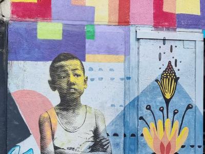 Child Portrait with Colorful Lotus — Street art in Clermont-Ferrand