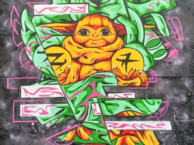 Cartoon Character Among Green Plants — Street art in Berlin