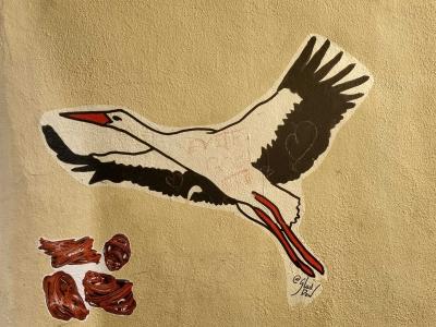 Carnivorous Stork — Street art in Strasbourg