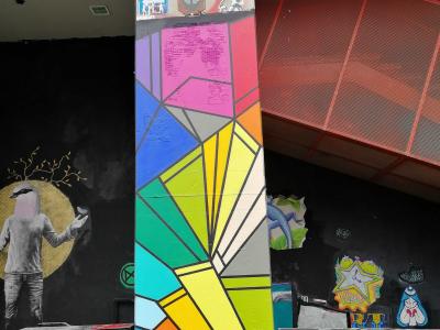 Geometric Multicolor Fan-Burst — Street art in Paris