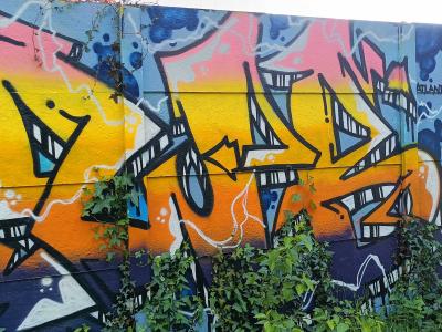 Blazing Lettering and the Character in a Hat — Street art in Nantes