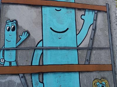 Turquoise character — Street art by Les Oides in Cordemais