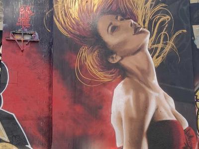 Hair in the Wind — Street art by JW Mind Strike in Prague