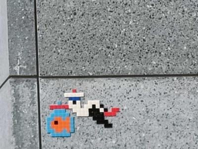 Pixelated Digital Character — Street art by Stork Pixelart in Nantes