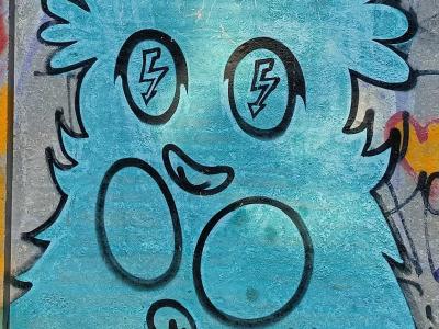 Blue Monster with Lightning Eyes — Street art in Rīga