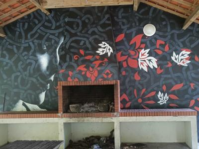 Portrait and Red Botanicals by Seb Bouchard — Street art by Seb Bouchard in Orée-d'Anjou