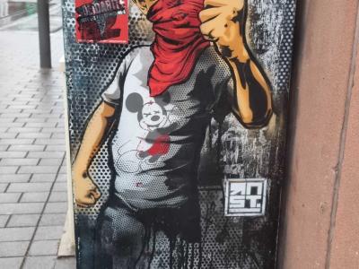Boy with Red Scarf — Street art by RNST in Strasbourg