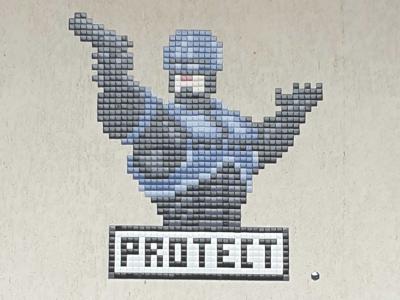 Robocop Protect — Street art by Zigom in Paris