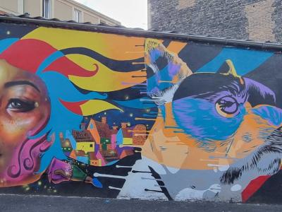 Femme et rapace, festival Latinograff — Street art de Newi (Julien Berland) à Clermont-Ferrand