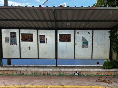 The Bunny and the Bus-Shelter Flowers — Street art by Astro Boy in Beniarbeig