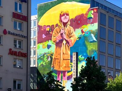 The girl with an umbrella — Street art by Kaos, Klive in Stockholm