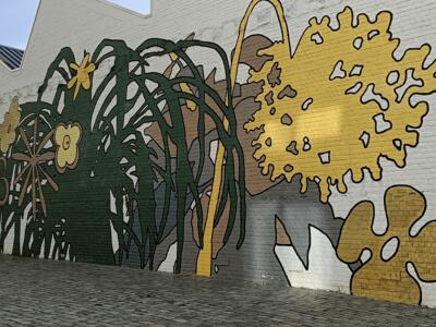 Yellow and green vegetation by Sestry Feldman — Street art by Sestry Feldman in Bruxelles