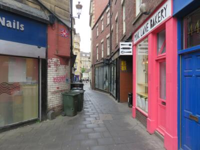 NCL_11, Space Invader on Pink Lane — Street art by Invader in Newcastle upon Tyne