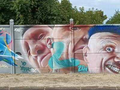 Deux visages hyperréalistes et tag Zen — Street art à Reims