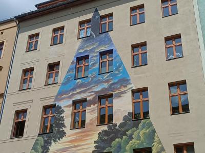 Triangular Escape with Biker — Street art in Berlin