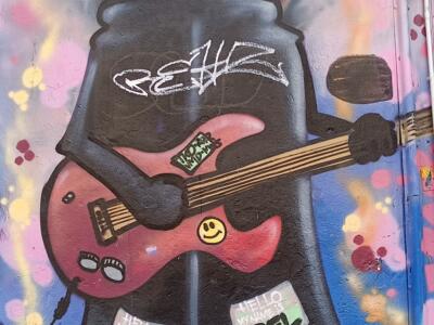 Chess piece with a red guitar — Street art in Marseille