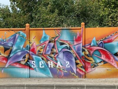 Schaz, lettrage turquoise et corail — Street art à Reims