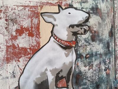 Cut-out bull terrier on a substation — Street art in Le Mans