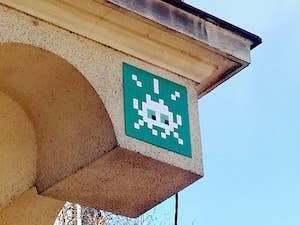LJU_27, Space Invader on Gruberjevo nabrežje 14 — Street art by Invader in Ljubljana