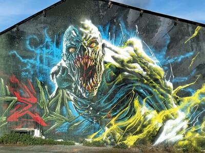 Spectral creature in blue and yellow — Street art by Ben Alpha in Nantes