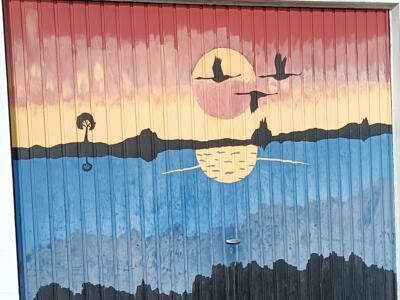 Coucher de soleil aux grues cendrées — Street art à Erkrath