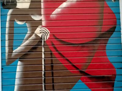 Louise Michel with the red flag — Street art in Marseille