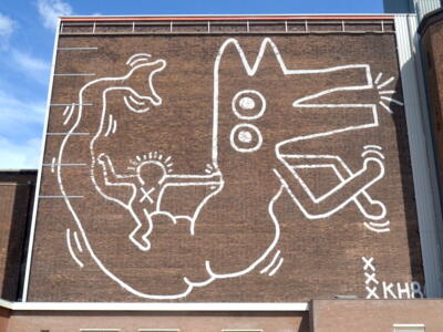 The Centrale Markthallen mural — Street art by Keith Haring in Amsterdam