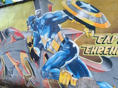Captain Ehrenfeld with his shield — Street art in Köln