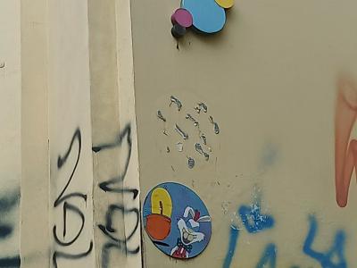 Relief Bubbles and Candle Rabbit — Street art in Berlin