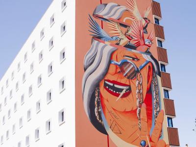 Grandmother with Sunglasses — Street art by Marina Capdevila in Granada