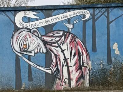 No axe cuts the root of thought — Street art by Tinta Crua in Lisboa