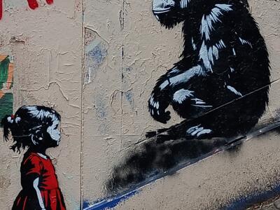 The girl in red and the great ape — Street art in Paris