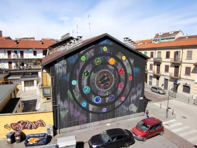 Borgata Tesso Circular Constellation — Street art by Corn79 in Torino
