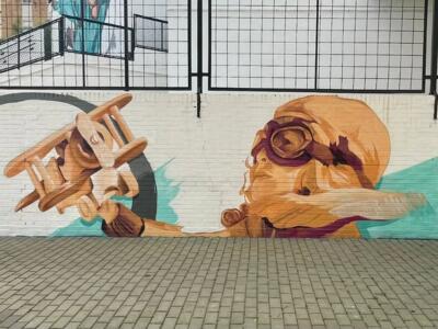 The Child Aviator at Ánsares — Street art by Konestilo in Huelva