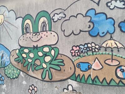 Grenouille verte et soleil — Street art à Düsseldorf